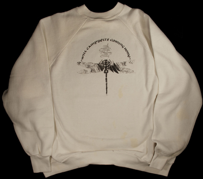 White sweatshirt with a dragonfly on the front commemorating Will Campbell. The text on the shirt is too small to read.