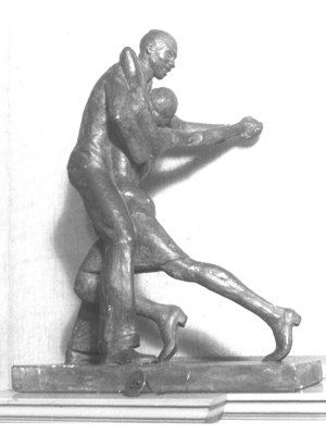 Sculpture of a man and a woman dancing.  