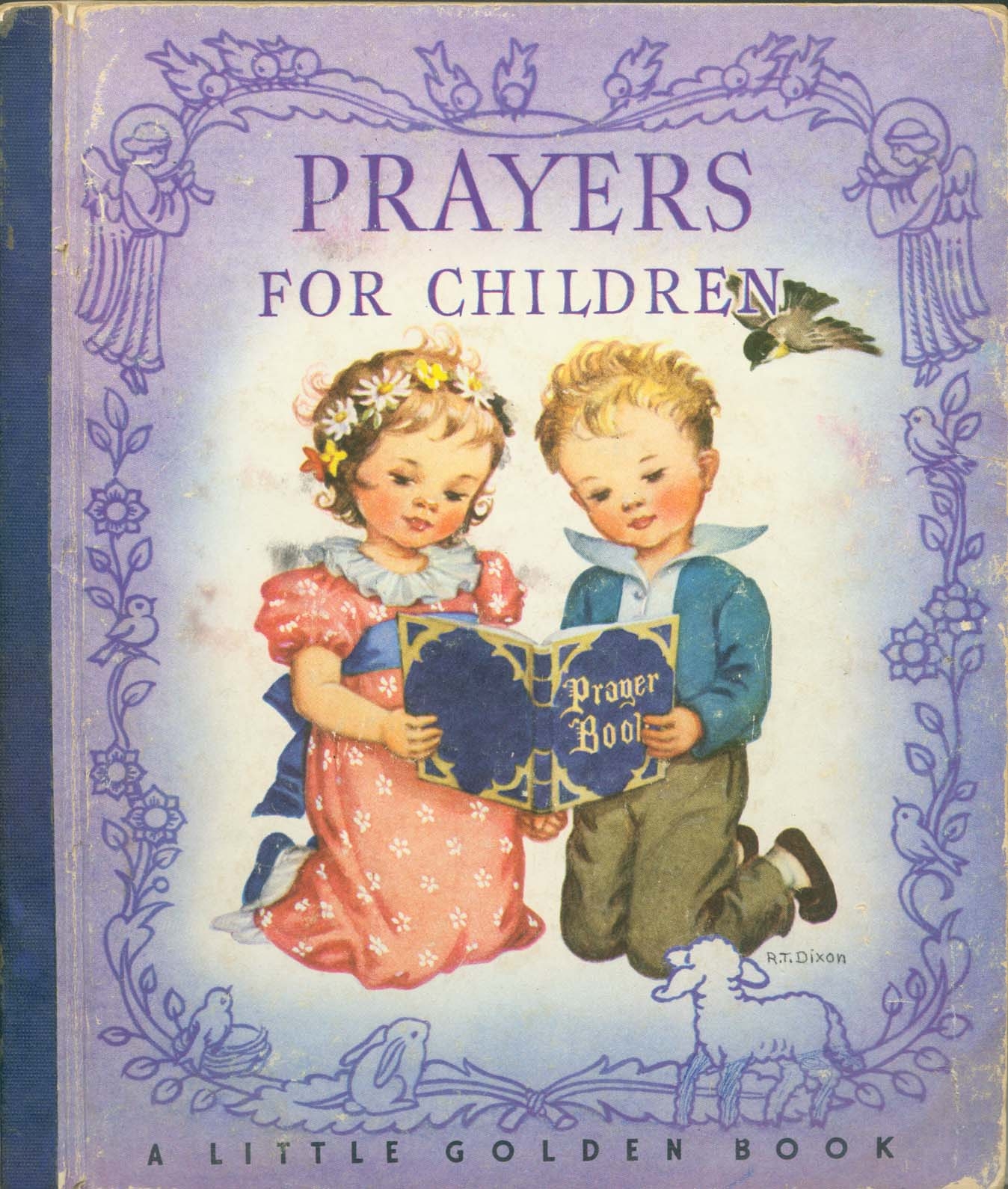 Two children reading from a prayer book.