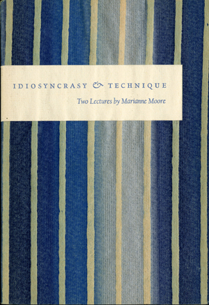 Book cover with columns of blue lines and the words Idiosyncrasy & Technique Two Lectures by Marianne Moore 