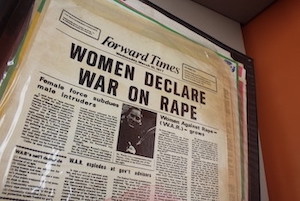 Photograph of newspaper clipping that reads Women Declare War on Rape